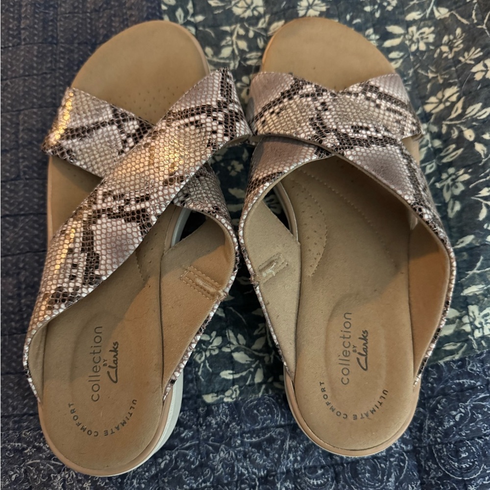 Clark’s snake print sandals